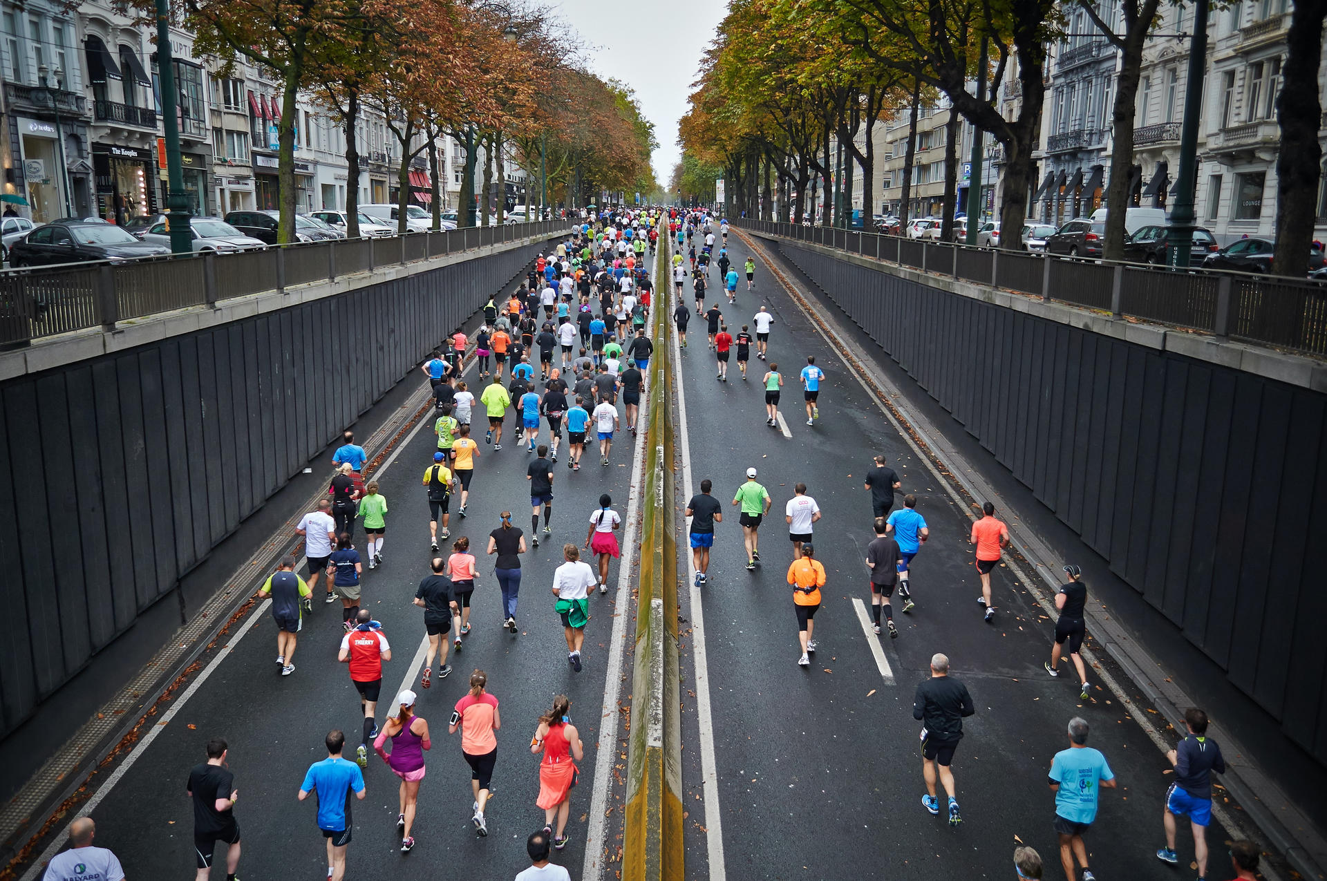 drone photo of a group running a marathon outdoors