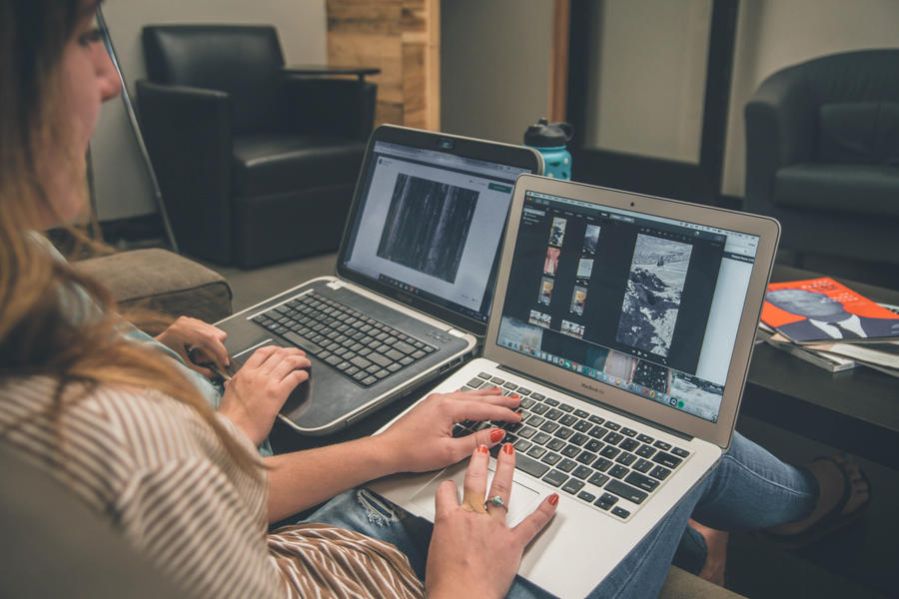 Women using laptop computers indoors